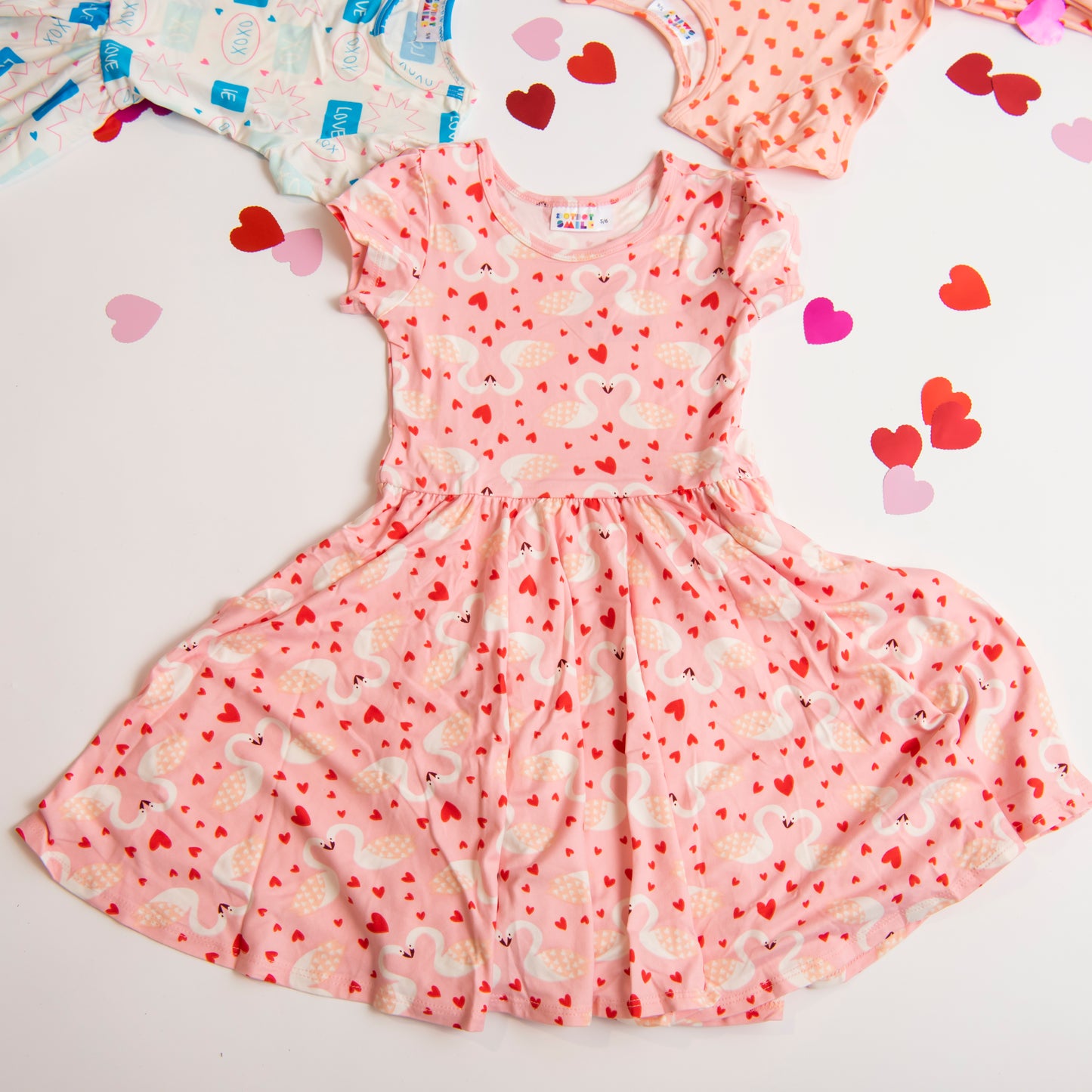 Pink Twirl Dress with Swans and Hearts